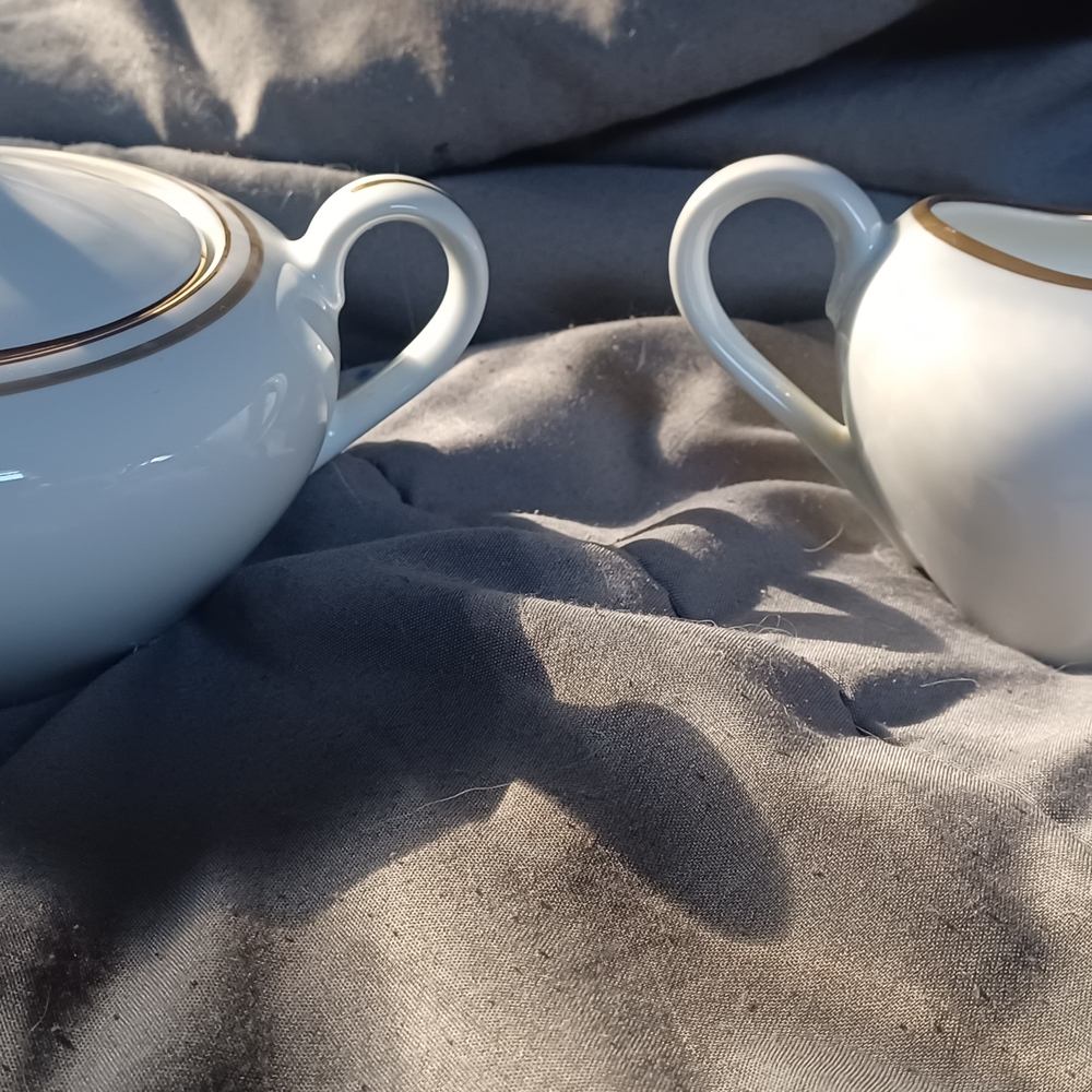 Elegant White and Gold Ceramic Creamer and Sugar Set